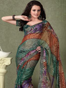 An casual wear perfect is ready to rock you.  This green georgette smoke saree is simply designed with abstract floral art print work on all over saree. This beautiful saree is used for casual porpose which gives you a singular and dissimilar look. Color blend of this saree is nice. Matching blouse is available with this saree. Slight color variations possible due to differing screen and photograph resolution.  