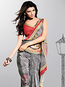 This dark grey crepe saree is nicely designed with paisley and abstract art digital print work in fabulous style. Get an attractive look with this casual wear saree. Fancy printed saree paired with matching blouse. Slight Color variations are possible due to differing screen and photograph resolutions.