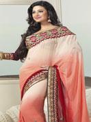The glamorous silhouette to meet your most dire fashion needs. This peach and orange saree is beautifully designed with extensive embroidered border and butti patch work. Embroidery is done with resham, zari and sequins work. This fabulous party wear saree is specially crafted for your stunning and gorgeous look. This beautiful drape is crafted with faux georgette fabric. Matching blouse come along with this saree. Slight color variations are possible due to differing screen and photograph resolution.