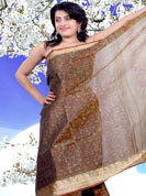 Your search for elegant look ends here with this lovely saree. This simple saree is nicely designed with beautiful print work on all over in floral patterns with art silk border. This saree is made with silk fabric. Matching blouse is available. It’s cool and has a very modern look to impress all. Slight Color variations are possible due to differing screen and photograph resolutions.
