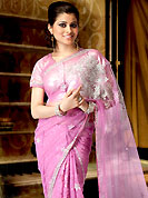 Let your personality articulate for you with this amazing embroidered saree. This saree blown up zarkan worked embroidered border and floral butti on all over saree make different to others. Saree gives you a singular and dissimilar look. This drape material is Net. Matching blouse is available. This saree is also available in blue and reddish red colors. Slight color variations are possible due to differing screen and photograph resolution.