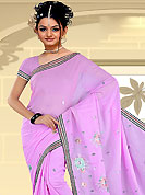 Outfit is a novel ways of getting yourself noticed. This purple saree have beautiful embroidery work which is embellished with resham and sequins work in form of floral motifs. Beautiful embroidery patch work border on saree make attractive to impress all. This beautiful drape is crafted with georgette fabric. Matching blouse is available. This saree is also available in red, green, pink, peach, aqua, orange, voilet colors. Slight Color variations are possible due to differing screen and photograph resolutions.