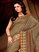 An endearing splash oh colors look gorgeous tridimensional charm. This olive green and fawn art silk saree is nicely designed with floral, zigzag and geometric print work. Matching blouse is available with this saree. Accessories shown in the image is just for photography purpose. Slight color variations are possible due to differing screen and photograph resolution.