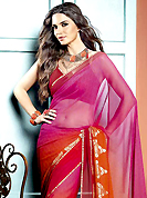 Try out this year top trend, glowing, bold and natural collection. This beautiful shaded magenta and rust faux georgette saree is nicely designed with abstract, stripe print and graceful patch border. Beautiful print work on saree make attractive to impress all. It will enhance your personality and gives you a singular look. Matching blouse is available with this saree. Slight color variations are due to differing screen and photography resolution.