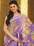 Envelope yourself in classic look with this charming saree. This beautiful light purple faux georgette saree is nicely designed with floral print work. Beautiful print work on saree make attractive to impress all. It will enhance your personality and gives you a singular look. Matching blouse is available with this saree. Slight color variations are due to differing screen and photography resolution.