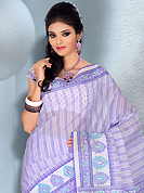 Dreamy variation on shape and forms compliment your style with tradition. This beautiful off white, light purple and sea green cotton saree is nicely designed with paisley, abstract and floral print work. It will enhance your personality and gives you a singular look. Matching blouse is available with this saree. Slight color variations are due to differing screen and photography resolution.