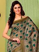 Ultimate collection of embroidered sarees with fabulous style. This dusty fawn art silk saree is nicely designed with floral, stripe print, self weaving zari and patch bordered work. Beautiful embroidery work on saree make attractive to impress all. This saree gives you a modern and different look in fabulous style. Matching blouse is available. Slight color variations are possible due to differing screen and photograph resolution.