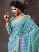 Get ready to sizzle all around you by sparkling saree. This beautiful sky blue cotton saree is nicely designed with paisley, abstract, geometric print and self weaving zari work. Beautiful print work on saree make attractive to impress all. It will enhance your personality and gives you a singular look. Matching blouse is available with this saree. Slight color variations are due to differing screen and photography resolution.