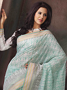 The traditional patterns used on this saree maintain the ethnic look. This beautiful off white and sky blue cotton saree is nicely designed with abstract print and self weaving zari work. Beautiful print work on saree make attractive to impress all. It will enhance your personality and gives you a singular look. Matching blouse is available with this saree. Slight color variations are due to differing screen and photography resolution.