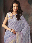 The most radiant carnival of style and beauty. This beautiful off white and blue cotton saree is nicely designed with abstract print and self weaving zari work. Beautiful print work on saree make attractive to impress all. It will enhance your personality and gives you a singular look. Matching blouse is available with this saree. Slight color variations are due to differing screen and photography resolution.