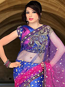 Embroidered sarees are the best choice for a girl to enhance her feminine look. This shaded dark blue and hot pink net lehenga style saree have beautiful embroidery patch work which is embellished with sequins, stone, cutdana and cutbeads work. Fabulous designed embroidery gives you an ethnic look and increasing your beauty. Matching blouse is available. Slight Color variations are possible due to differing screen and photograph resolutions.