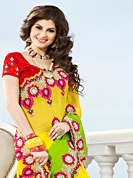 Keep the interest with this designer embroidery saree. This shaded yellow and light green viscose georgette saree have beautiful embroidery patch work which is embellished with resham, stone and beads work. Fabulous designed embroidery gives you an ethnic look and increasing your beauty. Contrasting red blouse is available. Slight Color variations are possible due to differing screen and photograph resolutions.