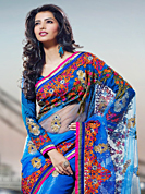 It is color this season and bright shaded suits are really something that is totally in vogue. This blue net saree have beautiful embroidery patch work which is embellished with resham, zari and stone work. Fabulous designed embroidery gives you an ethnic look and increasing your beauty. Matching blouse is available. Slight Color variations are possible due to differing screen and photograph resolutions.