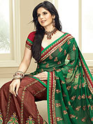 The traditional patterns used on this saree maintain the ethnic look. Net and faux georgette saree make you trendy look. This Drape has a beautiful and heavy Embroidered of resham, sequins, kasab and patch work. Pallu is beautified with embroidered butti and border. This saree have an awesome color combination and matching designer blouse. Slight color variations possible due to differing screen and photograph resolution.