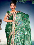 Attract all attentions with this embroidered saree.  This saree made with silk with georgette mix fabric. Saree have beautiful embroidery work on pallu and border. This saree is nicely designed with resham, zari and sitara work to give you pretty and singular look. The border of this saree is a symbol of elegance in its own. Matching blouse is available. Slight Color variations are possible due to differing screen and photograph resolutions.