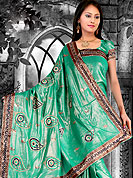 Try out this year top trends, glowing, bold and natural collection.  This saree made with silk with georgette mix fabric. This saree have beautiful embroidery work on pallu and border. This saree is nicely designed with resham, zari and sitara work to give you pretty and singular look. The border of this saree is a symbol of elegance in its own. Matching blouse is available. Slight Color variations are possible due to differing screen and photograph resolutions.
