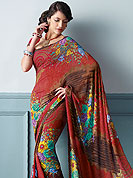 Printed saree maintain the artistic look as well as present look. This beautiful and pretty printed saree nicely designed with Stylish floral pattern. The saree is specially crafted for your stunning look and terrific style. This saree material is georgette. Matching Blouse is available. Slight color variations are possible due to differing screen and photograph resolution.