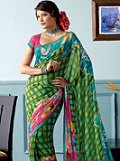 Ultimate printed saree which is surely going to make every women look gorgeous. This beautiful and pretty printed saree nicely designed with Stylish floral and check pattern. The saree is specially crafted for your stunning look and terrific style. This saree material is georgette. Matching Blouse is available. Slight color variations are possible due to differing screen and photograph resolution.
