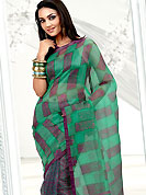 The popularity of this dress comes from the fact that it showcases the beauty modesty as well as exquisitely. This lime and purple net printed casual wear saree have beautiful floral and block print work on all over. Border has amazing contrasting fabric lace. It’s cool and has a very modern look to impress all. Matching blouse is available.  Slight Color variations are possible due to differing screen and photograph resolutions.