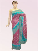 Heavy stone work saree with two shaded blue and gray golden pearl work on all over border