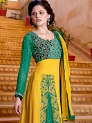 Motivate your look with this yellow and green suit. This suit adorns with amazing swirls pattern embroidery works on kameez. Beautiful rich embroidery on choli and front of kameez with border done with resham, sequins and zari work which is enhanced your personality. This drape material is faux georgette. Matching churidar and dupatta is available with this suit. Slight Color variations are possible due to differing screen and photograph resolutions.