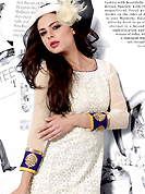 Look stunning rich with dark shades and floral patterns. This beautiful designer white net and georgette readymade tunic have amazing embroidery patch work is done with resham work. The entire ensemble makes an excellent wear. This is a perfect patry wear readymade kurti. Bottom and accessories shown in the image is just for photography purpose. Slight Color variations are possible due to differing screen and photograph resolutions.