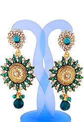 Go with this earring designed in a Sun shaped frames which are nicely designed with diamonds, hanging stones and enamel work. The base frame of earring is made with alloy metal. Keep away from water, sweat and perfume. Slight Color variations are possible due to differing screen and photograph resolution.