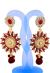 Go with this earring designed in a Sun shaped frames which are nicely designed with diamonds, hanging stones and enamel work. The base frame of earring is made with alloy metal. Keep away from water, sweat and perfume. Slight Color variations are possible due to differing screen and photograph resolution.