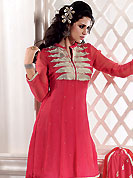 Different colors are a perfect blend of traditional Indian heritage and contemporary artwork. This red A-Line kameez has beautiful embroidered patch work done with zari and dupion work in form of floral motifs. Embroidery on kameez and dupatta is highlighting the beauty of this suit. Matching dupatta and churidar come along with this suit. This beautiful party wear made with georgette fabric. Slight Color variations are possible due to differing screen and photograph resolutions.
