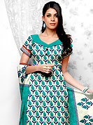 Bold colors created by the inventive drapes of textile catch the imagination like no other contemporary clothing. This Suit has beautiful printed kameez which is crafted with floral pattern. This casual wear drape made with cotton fabric. Matching dupatta and churidar is available. The entire ensemble makes an excellent wear. Slight Color variations are possible due to differing screen and photograph resolutions.