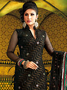 Your search for elegant look ends here with this lovely suit. The dazzling black A-Line kameez have amazing embroidery and patch work. Embroidery is done with resham, zari and stone work. Beautiful embroidery work on kameez is stunning. The entire ensemble makes an excellent wear. Matching churidar and dupatta is available with this suit. This beautiful wedding wear suit is made with viscose fabric. Slight Color variations are possible due to differing screen and photograph resolutions.