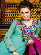 This season dazzle and shine in pure colors. The dazzling shaded sea green A-Line kameez have amazing embroidery and patch work. Embroidery is done with resham and lace work. Beautiful embroidery work on kameez is stunning. The entire ensemble makes an excellent wear. Contrasting deep pink churidar and dupatta is available with this suit. This beautiful wedding wear suit is made with faux georgette fabric. Slight Color variations are possible due to differing screen and photograph resolutions.