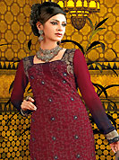 Attract all attentions with this embroidered suit. The dazzling maroon A-Line kameez have amazing embroidery and patch work. Embroidery is done with resham, zari and gota lace work. Beautiful embroidery work on kameez is stunning. The entire ensemble makes an excellent wear. Matching churidar and dupatta is available with this suit. This beautiful wedding wear suit is made with faux georgette fabric. Slight Color variations are possible due to differing screen and photograph resolutions.