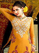 Be the cynosure of all eyes with this wonderful  wear in flattering colors and combinations. The dazzling orange A-Line kameez have amazing embroidery and patch work. Embroidery is done with resham and lace work. Beautiful embroidery work on kameez is stunning. The entire ensemble makes an excellent wear. Matching churidar and dupatta is available with this suit. This beautiful wedding wear suit is made with faux georgette fabric. Slight Color variations are possible due to differing screen and photograph resolutions.