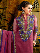 Try out this year top trend, glowing, bold and natural collection. The dazzling burgundy A-Line kameez have amazing embroidery and patch work. Embroidery is done with resham, zari and lace work. Beautiful embroidery work on kameez is stunning. The entire ensemble makes an excellent wear. Matching churidar and dupatta is available with this suit. This beautiful wedding wear suit is made with net fabric. Slight Color variations are possible due to differing screen and photograph resolutions.