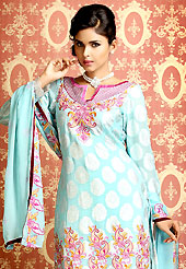 A desire that evokes a sense of belonging with a striking details. The dazzling aqua blue georgette kameez have amazing embroidery patch work. Embroidery is done with self weaving, resham and lace work in form of floral and paisley motifs. The entire ensemble makes an excellent wear. Matching crepe churidar and chiffon dupatta is available with this suit. Slight Color variations are possible due to differing screen and photograph resolutions.