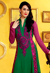 Outfit is a novel ways of getting yourself noticed. The dazzling green and dark magenta georgette churidar suit have amazing embroidery and patch work. Embroidery is done with resham and sequins work in form of floral motifs. Embroidery on kameez is highlighting the beauty of this suit. Beautiful patch work on kameez is stunning. Matching crepe churidar and chiffon dupatta come along with this suit. Accessories shown in the image is just for photography purpose. Slight Color variations are possible due to differing screen and photograph resolutions.