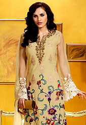 The fascinating beautiful subtly garment with lovely patterns. The dazzling beige chanderi churidar suit have amazing embroidery and patch work. Embroidery is done with resham and sequins work in form of floral motifs. Embroidery on kameez is highlighting the beauty of this suit. Beautiful patch work on kameez is stunning. Matching crepe churidar and chiffon dupatta come along with this suit. Accessories shown in the image is just for photography purpose. Slight Color variations are possible due to differing screen and photograph resolutions.
