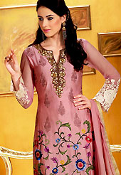 An occasion wear perfect is ready to rock you. The dazzling onion pink chanderi churidar suit have amazing embroidery and patch work. Embroidery is done with resham and sequins work in form of floral motifs. Embroidery on kameez is highlighting the beauty of this suit. Beautiful patch work on kameez is stunning. Matching crepe churidar and chiffon dupatta come along with this suit. Accessories shown in the image is just for photography purpose. Slight Color variations are possible due to differing screen and photograph resolutions.