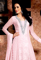 Emblem of fashion and beauty, each piece of our range of embroidered suit is certain to enhance your look as per today’s trends. The dazzling pink georgette churidar suit have amazing embroidery and patch work. Embroidery is done with resham and sequins work in form of floral motifs. Embroidery on kameez is highlighting the beauty of this suit. Beautiful patch work on neckline and border of kameez is stunning. Matching crepe churidar and chiffon dupatta come along with this suit. Accessories shown in the image is just for photography purpose. Slight Color variations are possible due to differing screen and photograph resolutions.