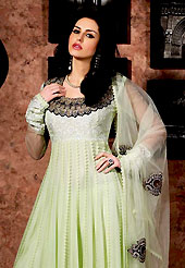 Attract all attentions with this embroidered suit. The dazzling light pastel green georgette churidar suit have amazing embroidery and patch work. Embroidery is done with resham, zari, sequins and cut work in form of floral motifs. Embroidery on kameez is highlighting the beauty of this suit. Matching crepe churidar and chiffon dupatta come along with this suit. Accessories shown in the image is just for photography purpose. Slight Color variations are possible due to differing screen and photograph resolutions.