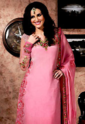 Get ready to sizzle all around you by sparkling suit. The dazzling shaded pink georgette churidar suit have amazing embroidery and patch work. Embroidery is done with resham and sequins work in form of floral motifs. Embroidery on kameez is highlighting the beauty of this suit. Matching crepe churidar and chiffon dupatta come along with this suit. Accessories shown in the image is just for photography purpose. Slight Color variations are possible due to differing screen and photograph resolutions.