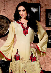 Dreamy variation on shape and forms compliment your style with tradition. The dazzling shaded beige georgette churidar suit have amazing embroidery and patch work. Embroidery is done with resham, zari and sequins work in form of floral motifs. Embroidery on kameez is highlighting the beauty of this suit. Matching crepe churidar and chiffon dupatta come along with this suit. Accessories shown in the image is just for photography purpose. Slight Color variations are possible due to differing screen and photograph resolutions.