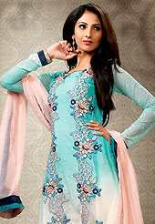 Look stunning rich with dark shades and floral patterns. This aqua and cream net churidar suit have amazing embroidery patch work is done with resham, zari and stone work. Embroidery on kameez is highlighting the beauty of this suit. Contrasting light peach churidar and chiffon dupatta come along with this suit. This Unstitched kameez can be customized upto 38 inches. Slight Color variations are possible due to differing screen and photograph resolutions.