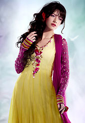 Take a look on the changing fashion of the season. This yellow chiffon churidar suit have amazing embroidery patch work is done with resham, zari and sequins work. Embroidery on kameez is highlighting the beauty of this suit. Contrasting dark magenta santoon churidar and chiffon dupatta come along with this suit. Slight Color variations are possible due to differing screen and photograph resolutions.