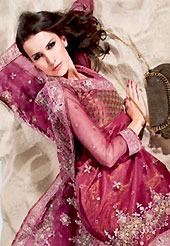 Let your personality articulate for you with this amazing embroidered suit. The dazzling burgundy churidar suit have amazing embroidery patch work is done with resham work. The entire ensemble makes an excellent wear. Matching churidar and dupatta is available with this suit. Slight Color variations are possible due to differing screen and photograph resolutions.