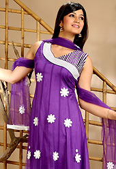 An occasion wear perfect is ready to rock you. The dazzling violet net churidar suit have amazing embroidery patch work is done with resham work. The entire ensemble makes an excellent wear. Matching churidar and dupatta is available with this suit. Slight Color variations are possible due to differing screen and photograph resolutions.