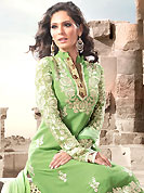 This season dazzle and shine in pure colors. The dazzling light pastel green georgette churidar suit have amazing embroidery patch work is done with resham work. The entire ensemble makes an excellent wear. Matching churidar and shaded dupatta is available with this suit. Slight Color variations are possible due to differing screen and photograph resolutions.
