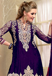 Let your personality articulate for you with this amazing embroidered suit. The dazzling dark violet jacquard churidar suit have amazing embroidery patch work is done with resham work. The entire ensemble makes an excellent wear. Matching churidar and dupatta is available with this suit. Slight Color variations are possible due to differing screen and photograph resolutions.