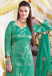 Let your personality articulate for you with this amazing embroidered suit. The dazzling light green salwar kameez have amazing embroidery patch work is done with zari, sequins and stone work. The entire ensemble makes an excellent wear. Matching salwar and dupatta is available with this suit. Slight Color variations are possible due to differing screen and photograph resolutions.